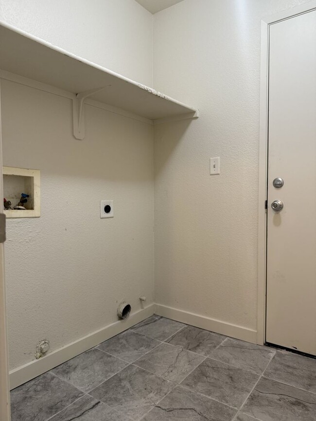 Building Photo - Available Now!!! With fresh paint and new ...