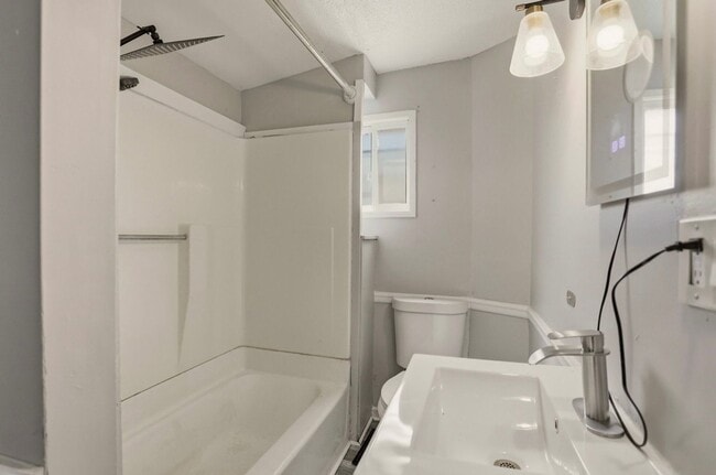 Building Photo - Updated 3BR Home with New Kitchen & 2-Car Garage