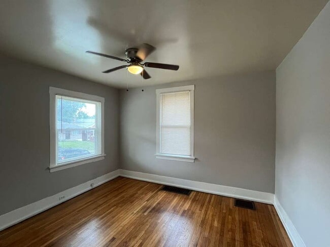 Building Photo - "Charming 2-Bedroom Retreat with Wood Floors with Basement!"