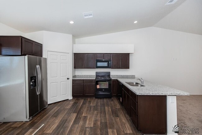 Building Photo - 7171 E 38th Ln