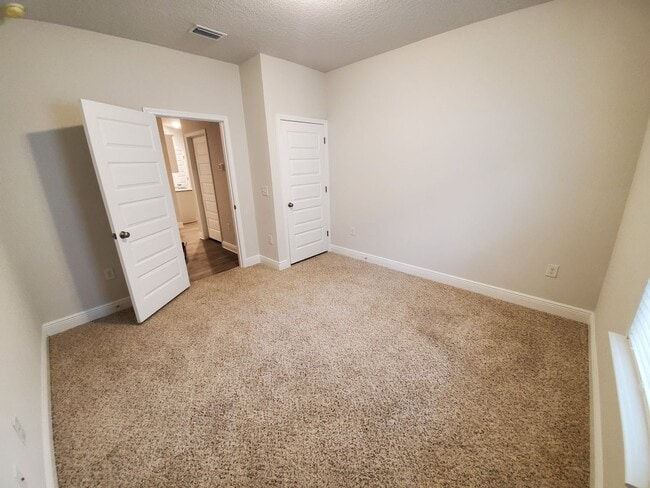 Building Photo - Modern 4Bed/2Ba Home w/Conveniently Accessible Location in PCB! *Garbage Service & Lawncare Inclu...