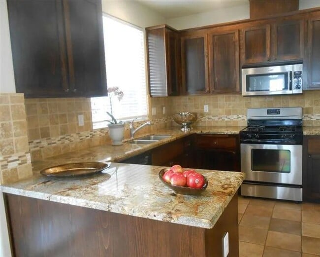 Building Photo - Great home with solar, centrally located n...