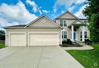 Building Photo - Wood Floors, Open Layout, Plenty of Natura...