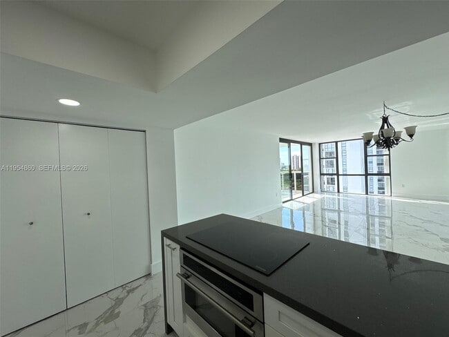 Building Photo - 3675 N Country Club Dr