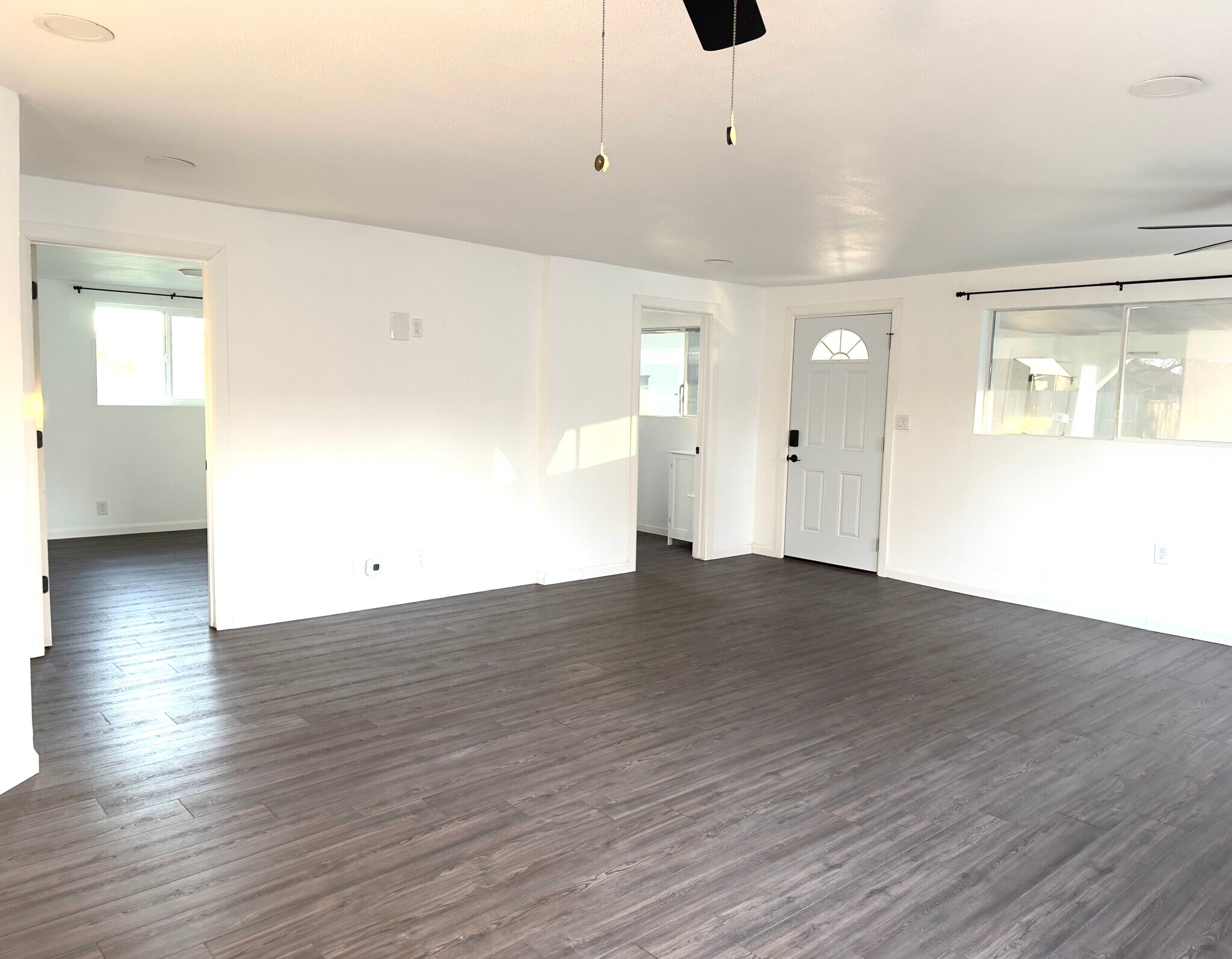 Great room with view of kitchen and hallway to br 1-2 - 16060 39th Ave