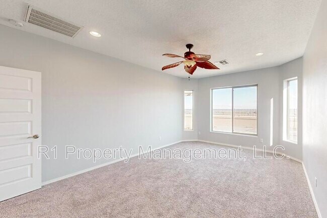 Building Photo - 6405 Kings Cyn Cv NE