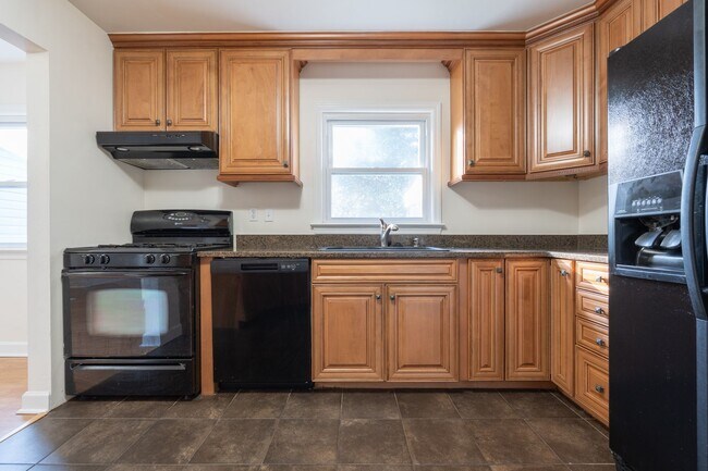 Building Photo - MOVE IN READY 4-bedroom Ranch home nestled in the Heart of Norfolk!