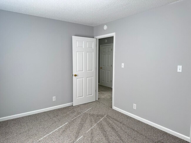 Building Photo - Just Painted and New Flooring Throughout! ...