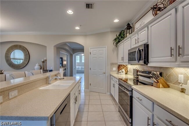 Building Photo - 14776 Calusa Palms Dr