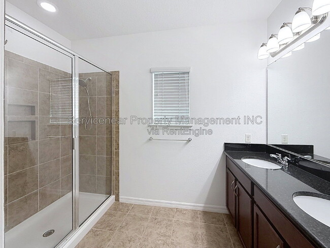 Building Photo - 9428 Woodcrane Dr