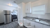 Building Photo - Remodeled top floor 1 Bd with hardwood flooring and spacious modern kitchen $1850