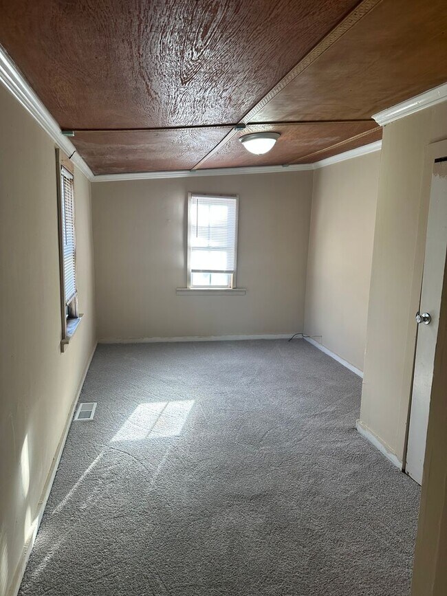 Building Photo - Four-Bedroom Bungalow with Fenced Yard Near Downtown Durham!