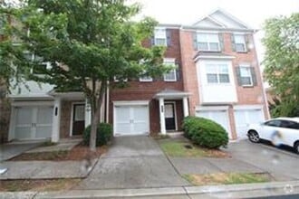 Building Photo - Beautiful and well maintenance three-story...