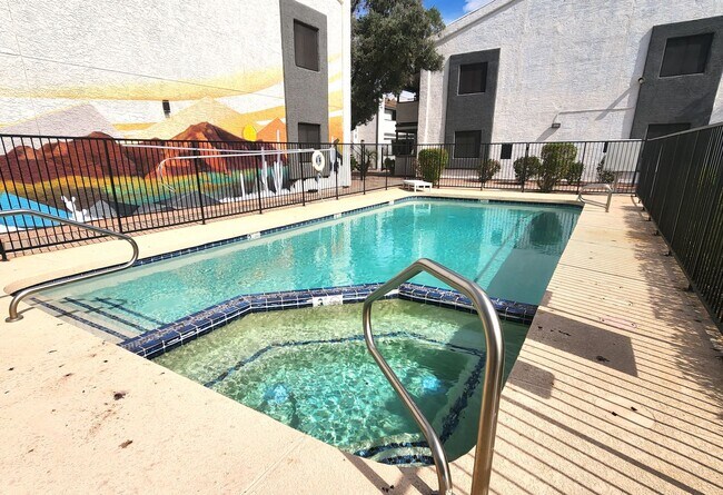 Building Photo - STUNNING TWO BEDROOMS CONDO WITH POOL CALL TODAY