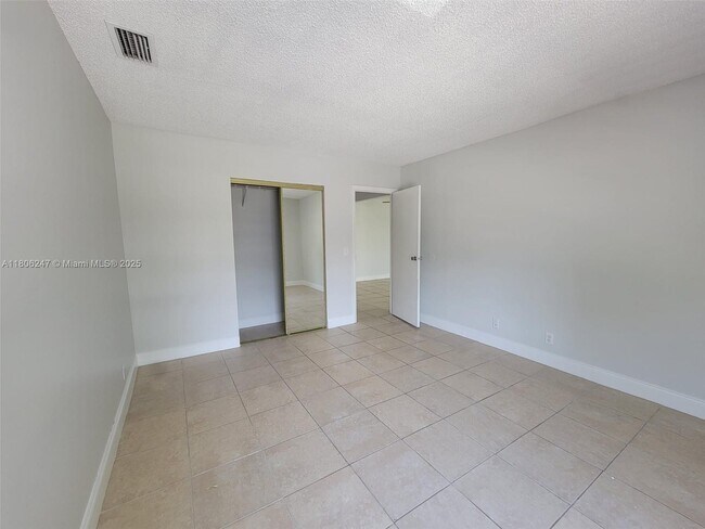 Building Photo - 5881 NW 57th Ave
