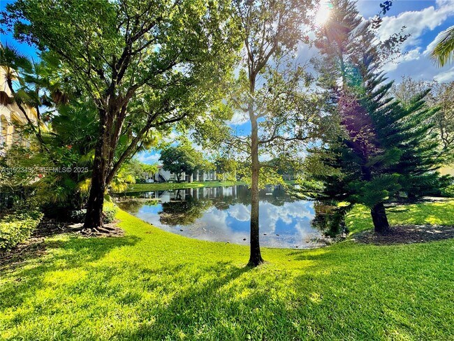 Building Photo - 120 Jacaranda Country Club Dr