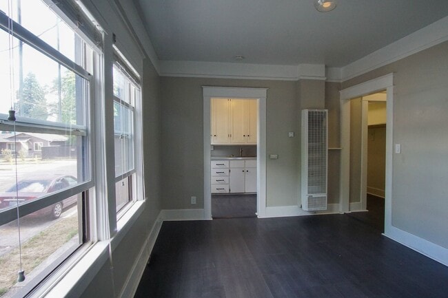 Building Photo - Move-in Special: Enjoy Modern Convenience w/Vintage Charm + Complimentary Laundry!
