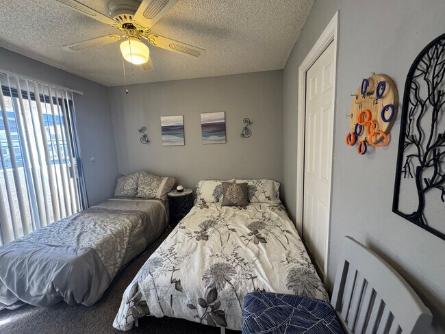 Building Photo - FURNISHED 2BR CONDO w/Utilities Water View Gated NO STAIRS