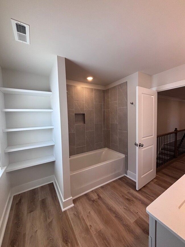 Building Photo - Brand new three-bedroom, 2.5-bath townhome