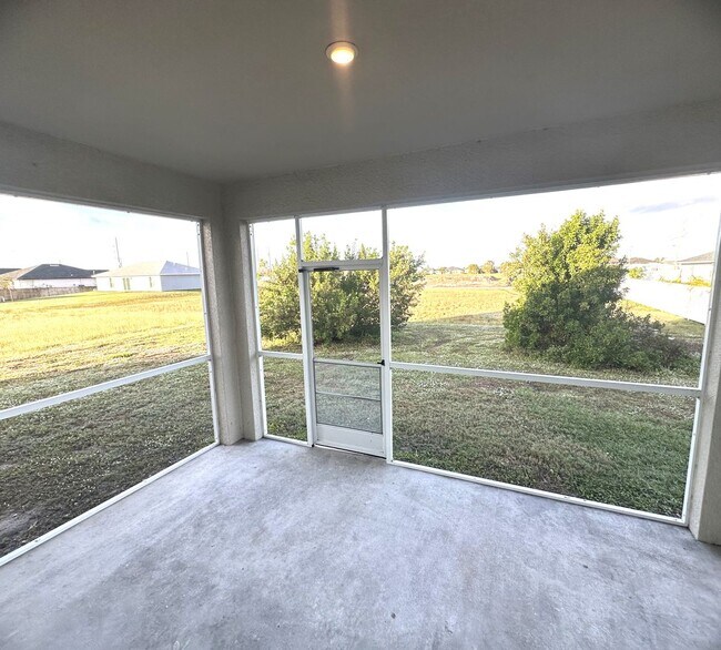 Building Photo - Available Mid April!! NW CAPE CORAL 3 BEDROOM 2 BATHROOM 2 CAR GARGAGE