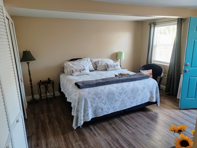 BIG main bedroom with access to private patio, lots of closet space and beautiful bathroom. - 12080 Moss Dr