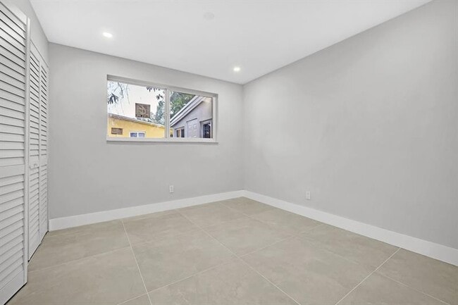 Building Photo - 5680 NE 7th Terrace
