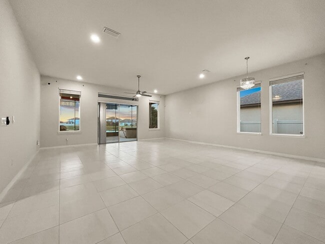 Building Photo - $1,500 OFF on Your 2nd Month’s Rent! Riverview Gem – 4BR/2BA Home with Screened-In Hot Tub & Solar!!