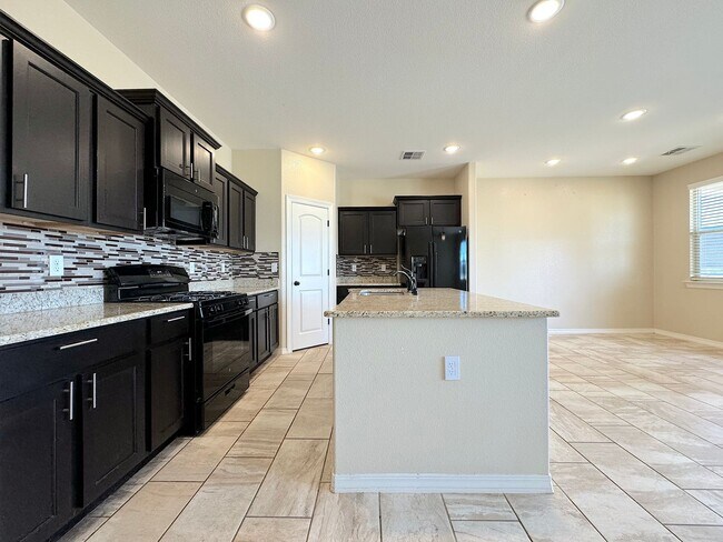 Building Photo - Northeast El Paso 4 Bed Refrig A/C!