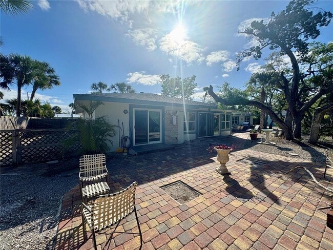 Building Photo - 7372 Melaleuca Way