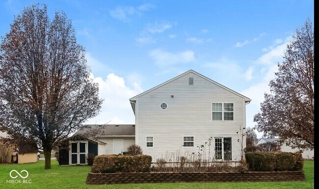 Building Photo - 6521 Rushing River