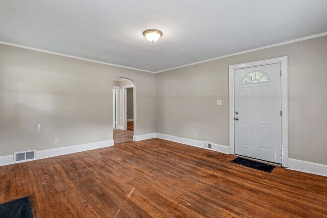 Building Photo - Adorable Home, Just Painted, Wood Flooring...
