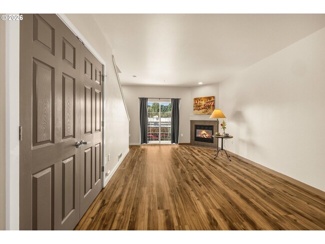 Building Photo - Main Street Living with Granite Kitchen, Gas Fireplace, and MAX Line Access