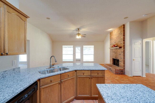 Building Photo - "Beautiful Single-Story Featuring an Office, Open-Concept Design, Dual Living Areas and a Large O...