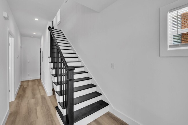 Building Photo - Modern New Construction Townhome with Roof...