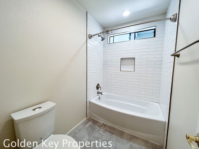 Building Photo - Welcome to this stunning 4-bedroom, 2.5-ba...