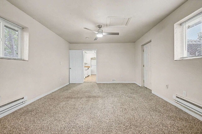 Building Photo - "Charming 3-Bedroom Duplex Retreat on Chester Street, Aurora – Cozy 1206 Sq Ft Home Awaiting Your...