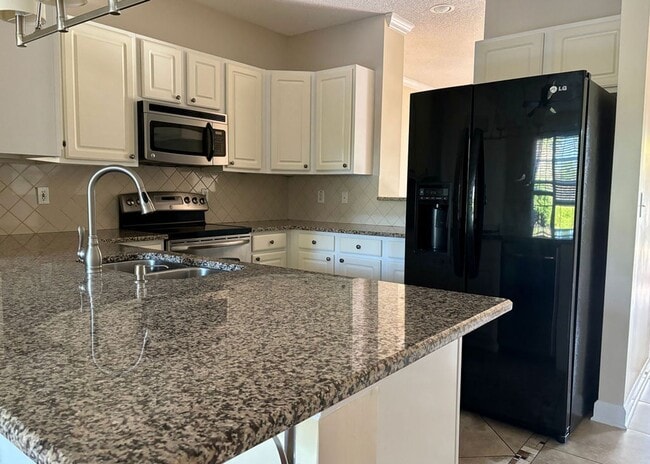 Building Photo - Available June 1st. Gorgeous 3 BR/2 BA Home Available in Desirable Whitney Lakes!