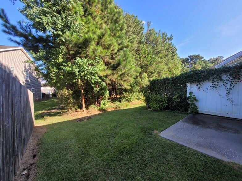 View from 8'x10' concrete patio at back door which backs onto Community Preserve - 2496 Stadium Dr