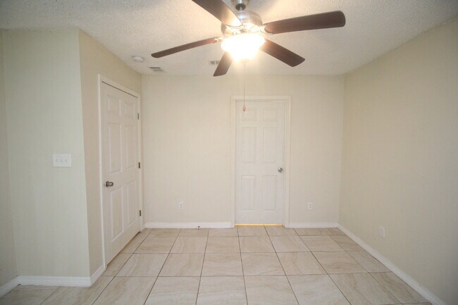 Building Photo - West Pensacola Duplex Living — 3BR Home with Open Floor Plan, Eat-In Kitchen, Covered Patio & Low...