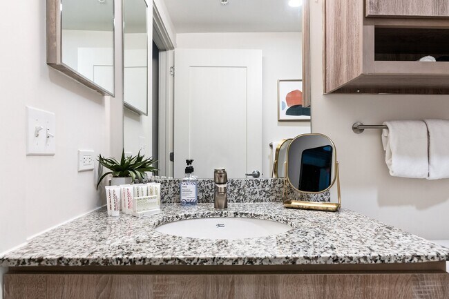 Building Photo - Midtown Magic: Big Savings + Big Perks!