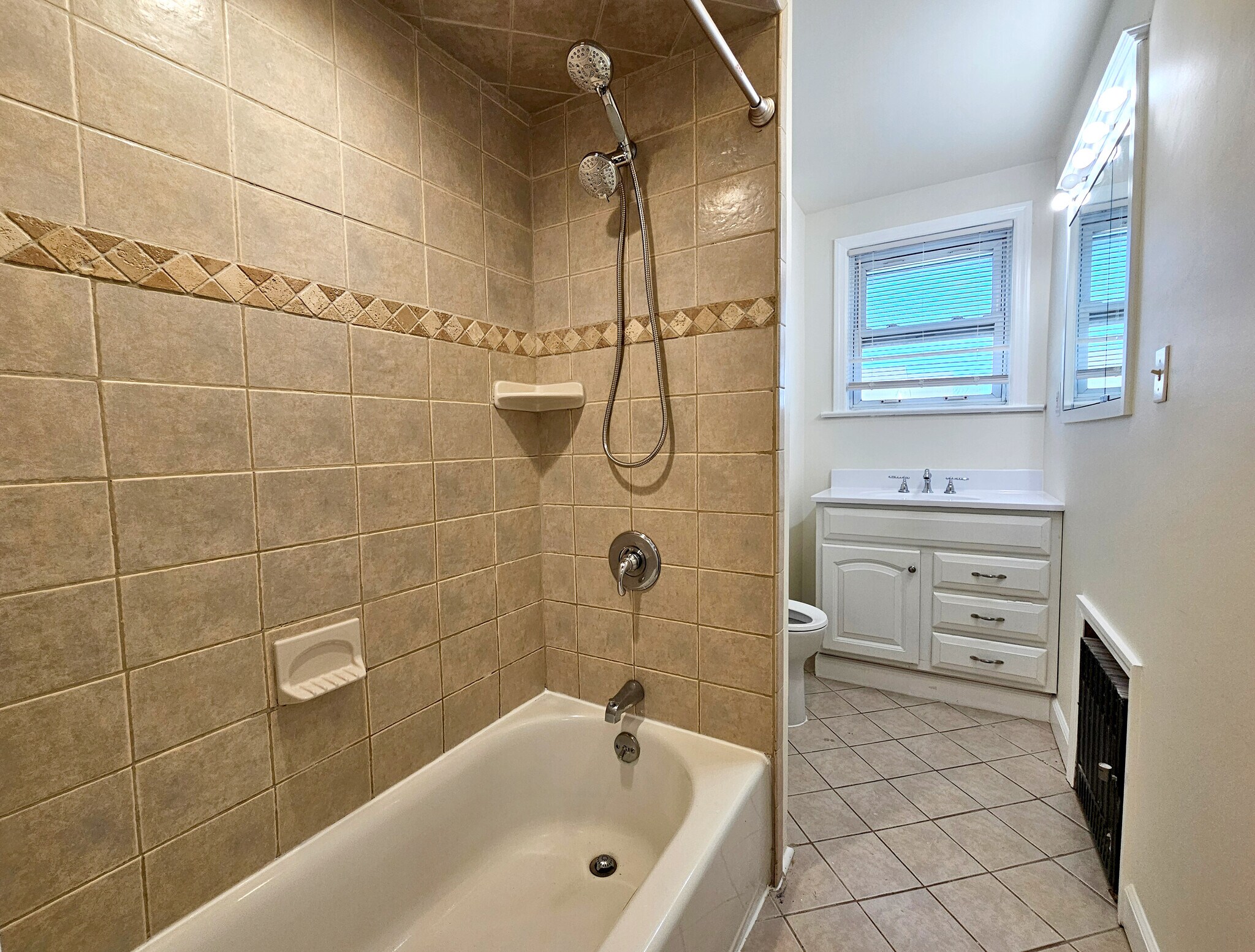 Full bathroom with a tub - 59 E Main St