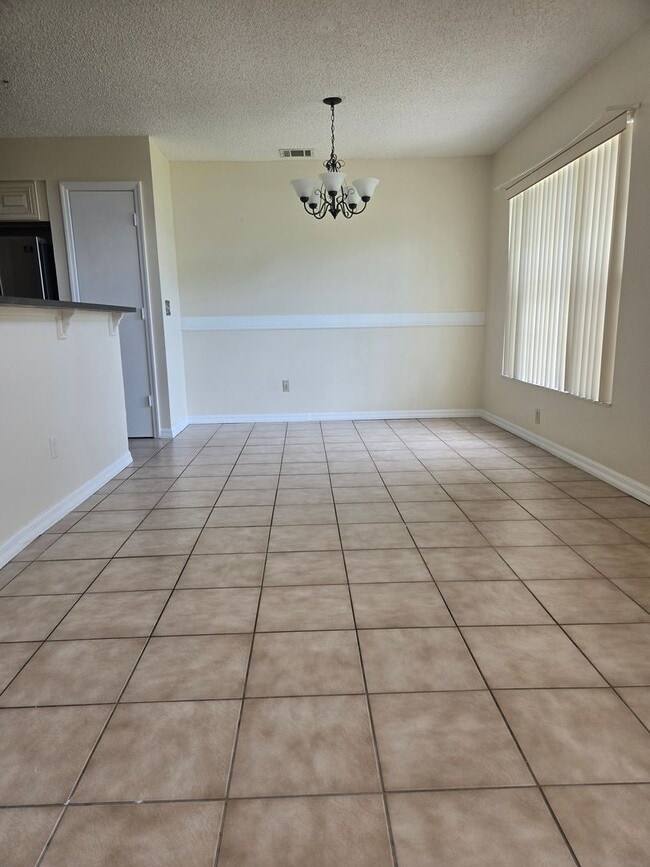 Building Photo - Beautiful 4 Bed / 2 Bath Single-Family Home with Fenced Yard & Screened Patio