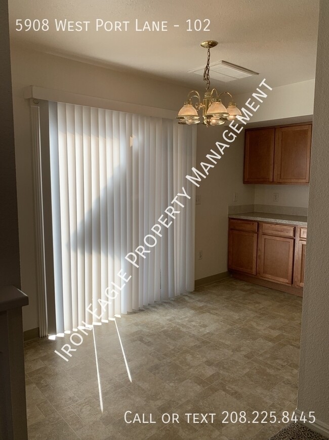 Building Photo - 5908 West Port Lane - 102-