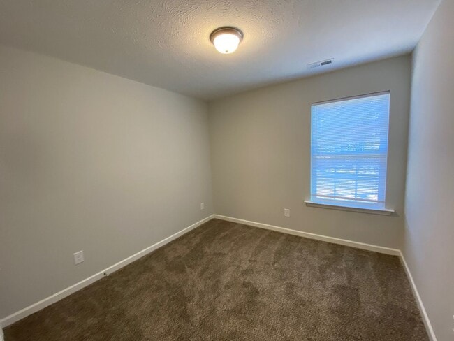 Building Photo - New 3 Bedroom 2 bath home with 2 Car Garage