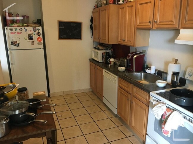 Building Photo - No Brokers Fee, Large Unit Steps from the T, Heat, Hot Water Included, Porch, Parking for Rent