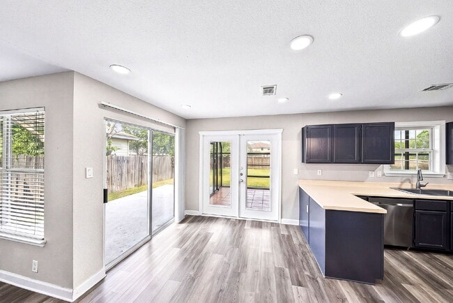 Building Photo - A Waterfall Shower, a Sunroom, and a Story Worth Coming Home To