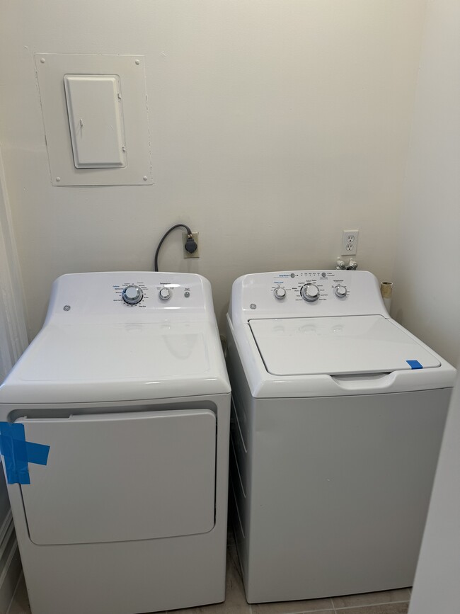 Each unit has new washer/dryer in pantry off the kitchen area - 118 Philip St