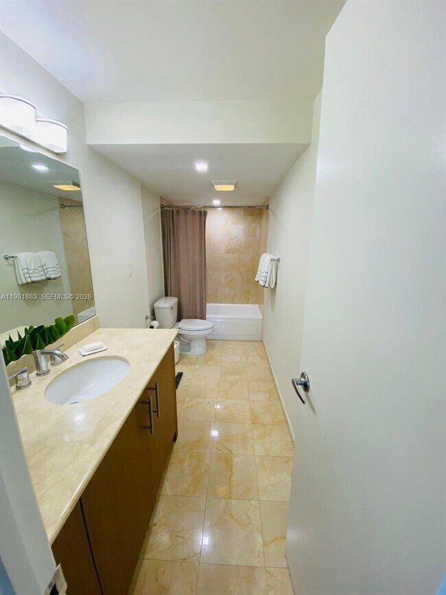 Building Photo - 10275 Collins Ave