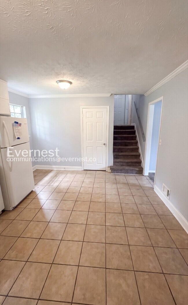 Building Photo - 4 Bed, 2.5 Bath Home with Carport / Available Now!