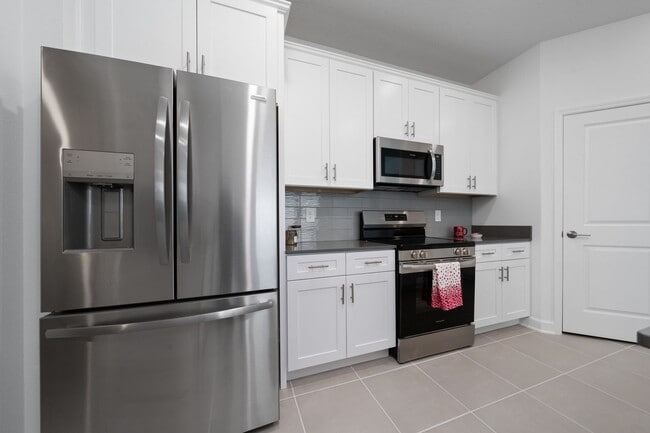 Building Photo - Beautiful and Brand New Single Family in T...
